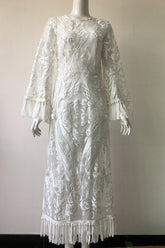 Einzigartiges Partykleid aus weißer Spitze mit Quaste
